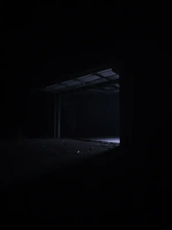 Un garage privé sans lumière ni raccordement électrique